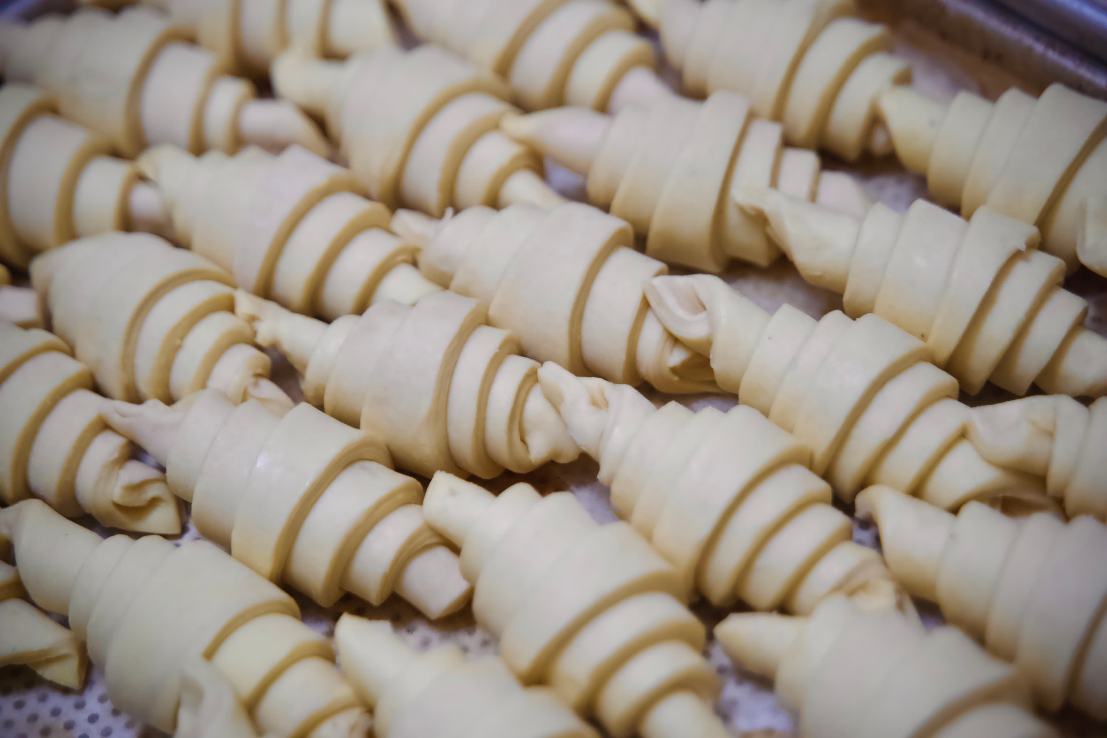 Background Image: Tray of Unbaked Croissants